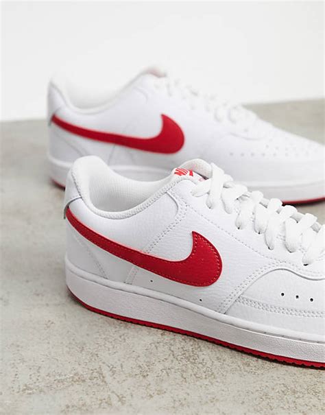 nike white sneakers with red tick